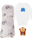 Gift set with Aden + Anais muslin wrap, cotton body suit with omnkey design and monkey finger puppet