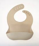 Silicone bib for baby in a neutral pebble colour