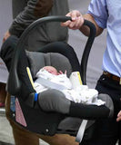 Prince George wrapped in Aden + Anais Birdy Muslin Wrap