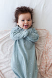 Baby wearing cotton and merino sleeping gown